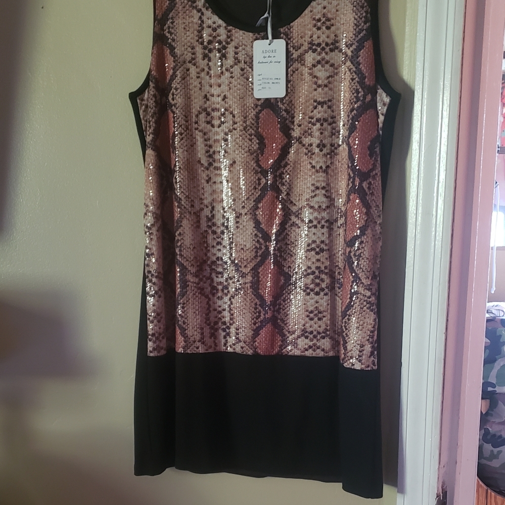 Night out anyone? New with tag size 14 Adore dress.